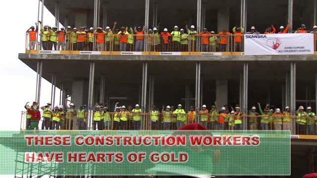 Construction workers, Santa deliver smiles to children at hospital