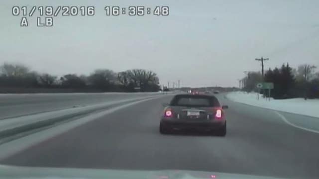 Man caught reading a novel while driving on highway in Eagan, Minn.