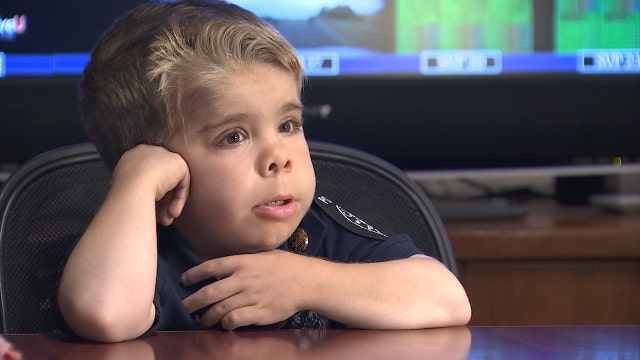 Little boy granted dream of being police officer for a day