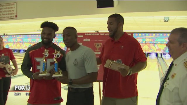 Buccaneers and firefighters battle on the bowling lanes