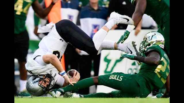 No. 8 UCF remains unbeaten, but loses QB Milton in 38-10 win