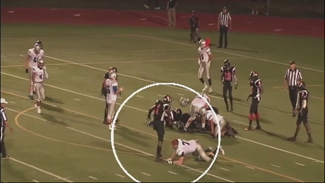 High school student removed from team after helmet incident