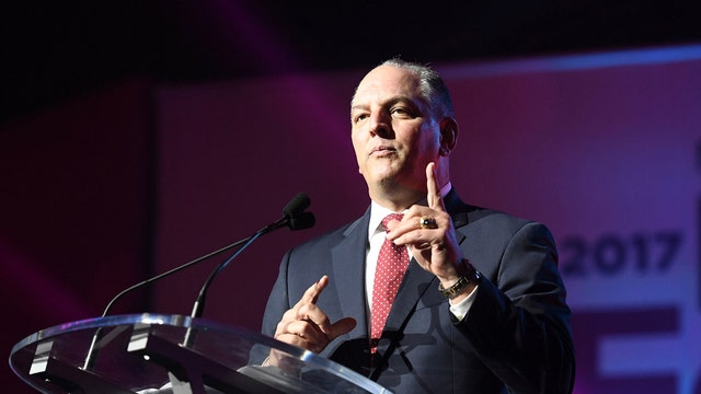 Louisiana's Democratic governor signs abortion ban into law