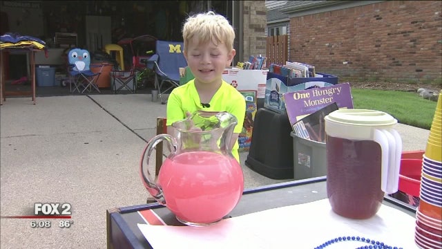 Boy holds lemonade stand for kids battling cancer to honor friend