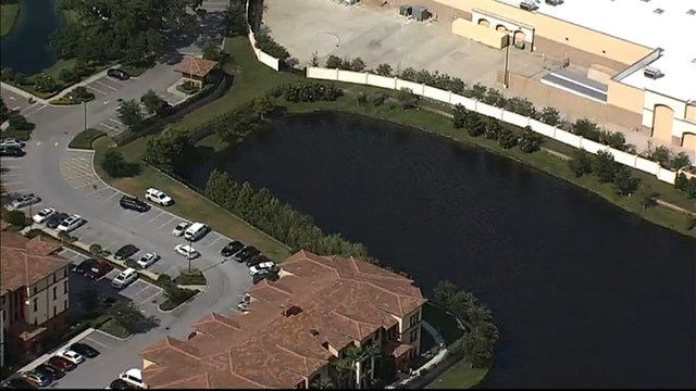 Woman's body found in Seminole pond