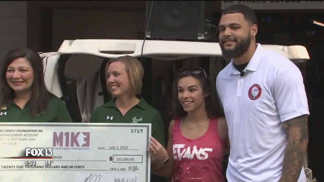 Mike and Ashli Evans' foundation makes higher ed accessible