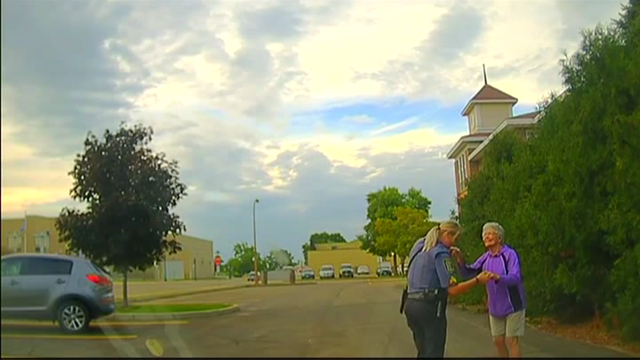 Dashcam video captures officer dancing with elderly woman