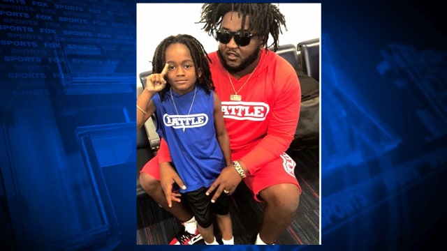 Blazing a trail: Father, 7-year-old son duo reach goals on (and off) football field