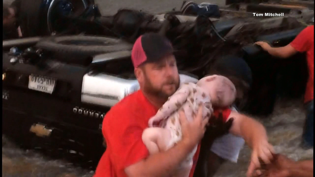 Parents thank Good Samaritans who rescued their children from flood