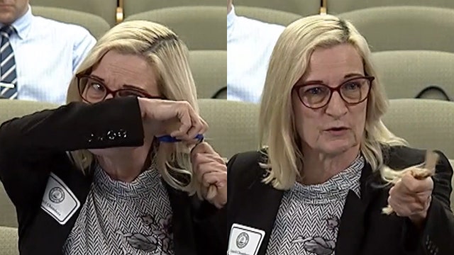 Tampa woman chops chunk of hair during city council meeting in effort to save trees