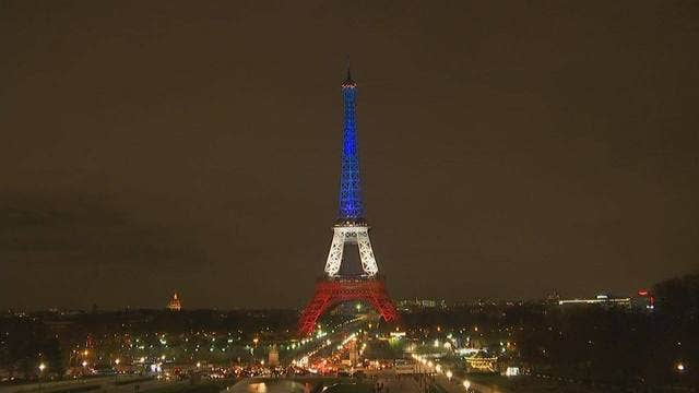 Eiffel Tower reopens lit in blue, white, and red