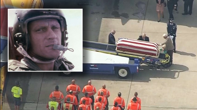 Son brings Vietnam War fighter pilot's lost remains home to Texas