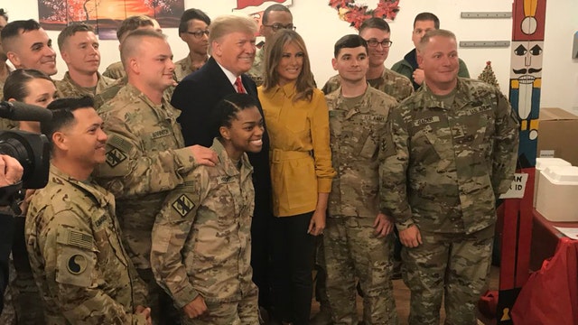 Trump makes unannounced visits to American troops in Iraq, Germany
