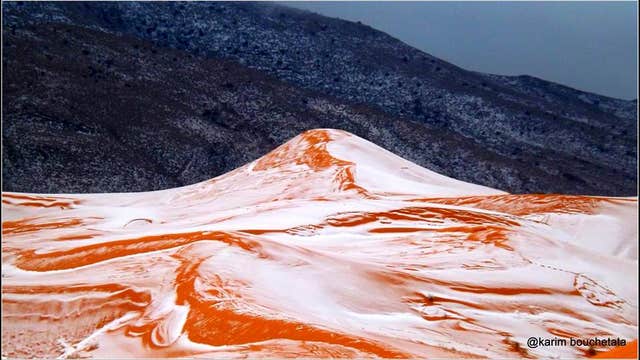 Snow falls in a Saharan Desert town for first time in decades