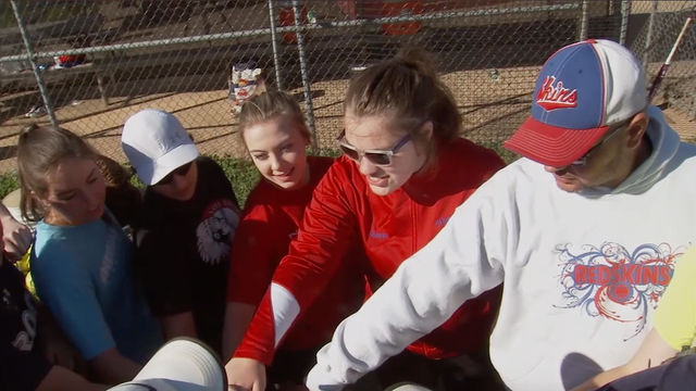 Teen with genetic disorder given first at-bat in softball game, hits home run