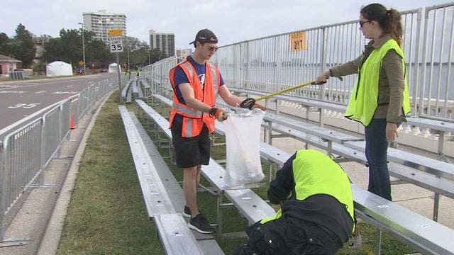 Volunteers clean up beads, trash after Gasparilla parade