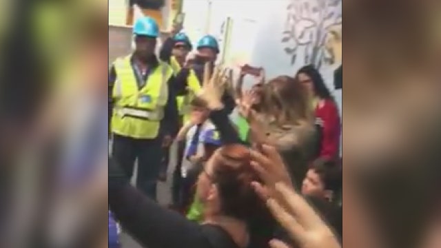 Puerto Rican students sing, pray with linemen who restored power