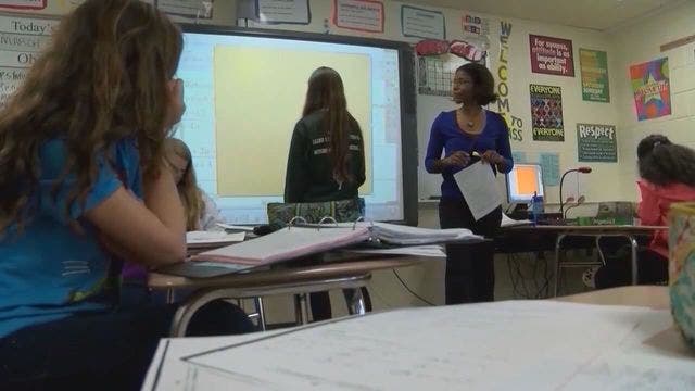 Scott signs education bill, clearing way for open enrollment