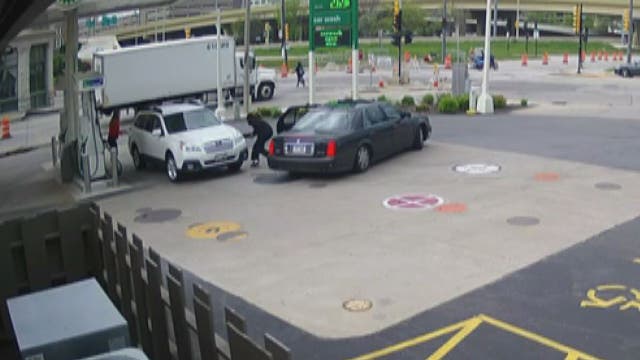 Woman thwarts car theft by jumping onto hood