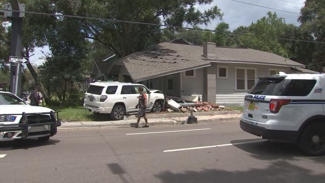 Vehicle hits house in Seminole Heights