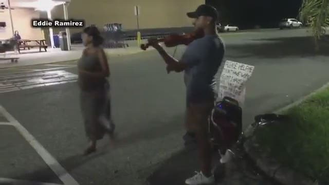 Mysterious violinist performs on streets of Polk Co.