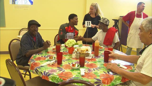 Bucs rookies serve lunch to needy