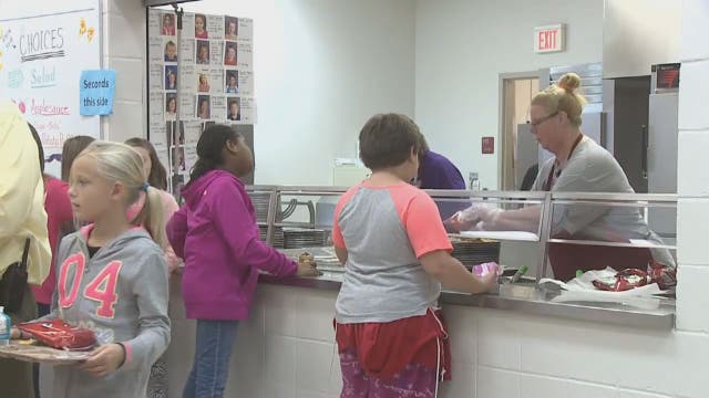 Man pays overdue school lunch fees for nearly 100 children