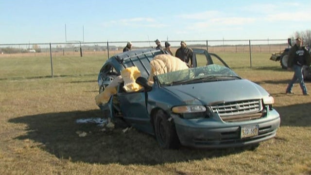 Watch a 1,465-pound pumpkin fall from 80 feet -- onto a minivan