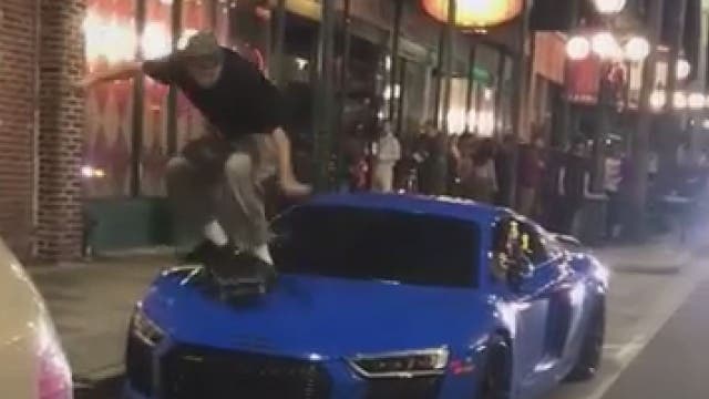 Video shows skateboarder damaging sports car along Ybor street