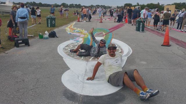 Artists transform asphalt into canvas using chalk