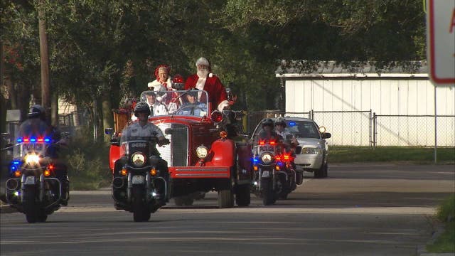 Law enforcement officers help Santa make season special for kids