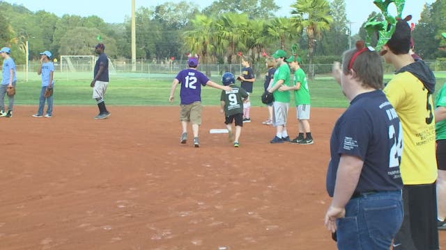 Charley on the field with Buddy Baseball