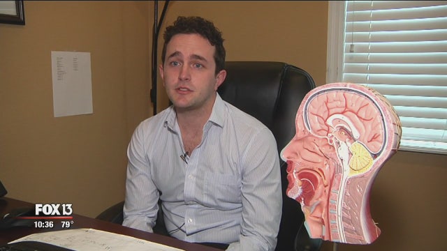 Student overcomes brain injury to become doctor
