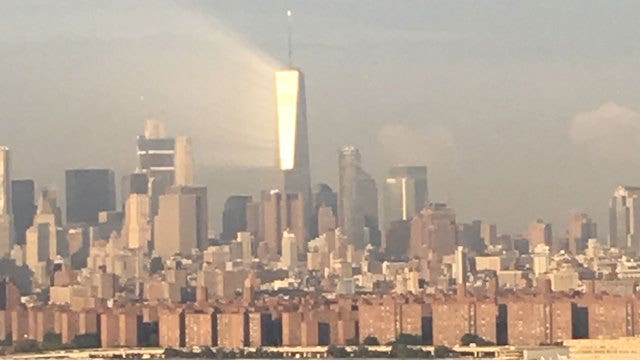 Ray of light beams off 1 World Trade Center