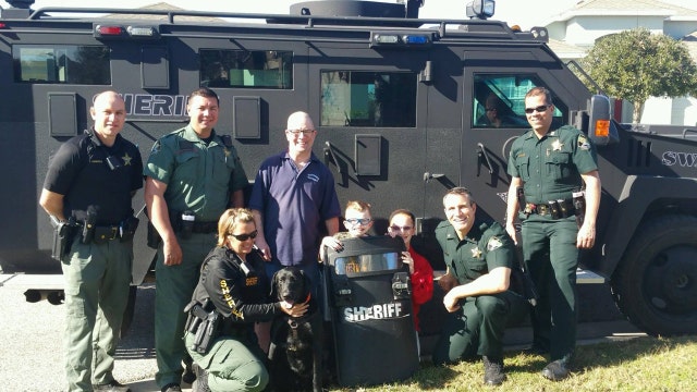 Deputies surprise terminally ill boy with massive 'police car'