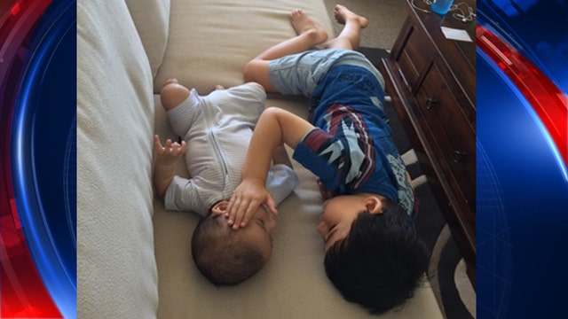 Mom captures 3-year-old boy comforting terminally ill infant brother