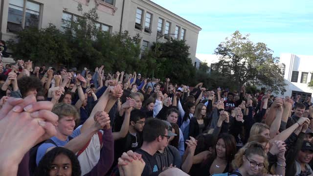 High school students protest Trump, larger protests scheduled this evening