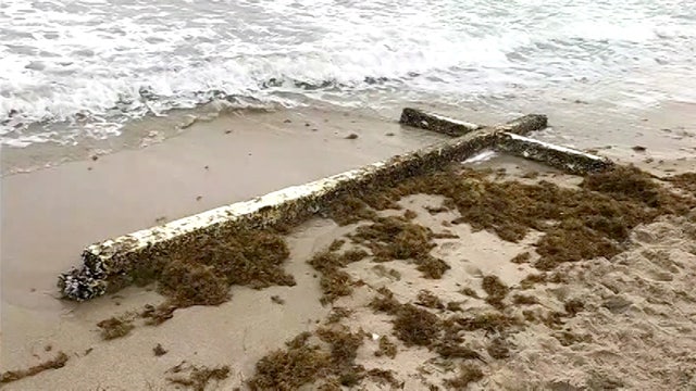 Giant cross washes ashore on Fort Lauderdale beach
