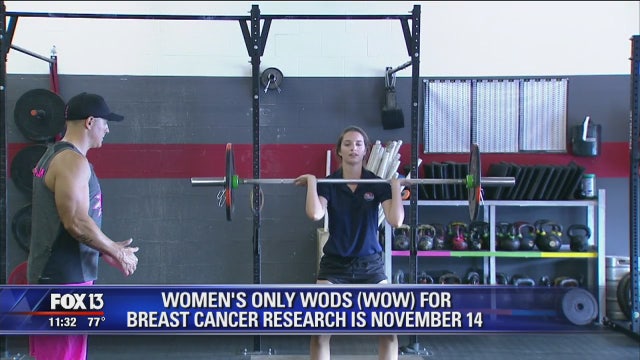 Lifting weights to raise money for breast cancer victims