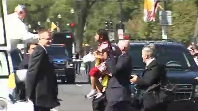 Little girl who greeted Pope had immigration message