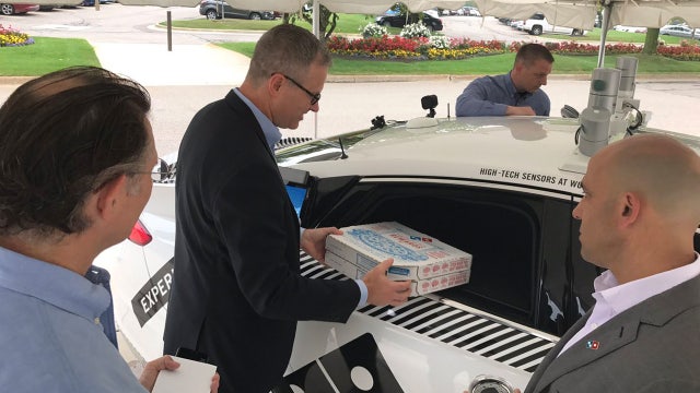 Delivery without drivers? Domino's, Ford team up for pizza delivery test