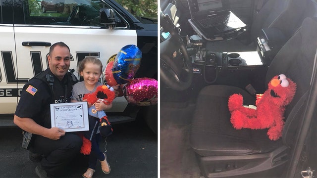 New York girl, 3, gives Elmo doll to officer so he wouldn't have to work alone