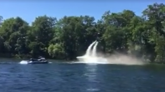 VIDEO: Man uses flyboard to put out boat fire