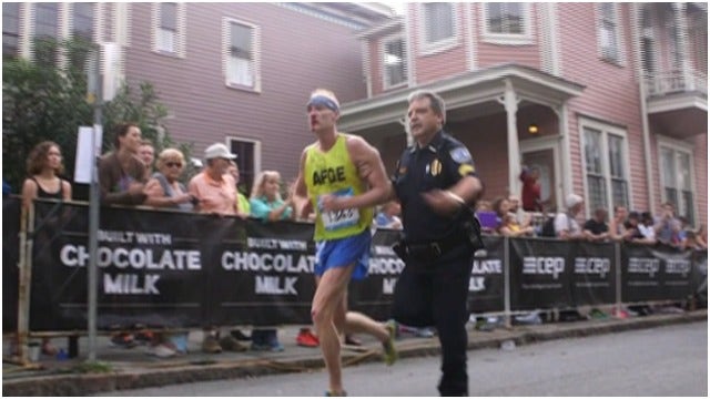 Ga. Officer Helps Injured Marathon Runner Cross Finish Line
