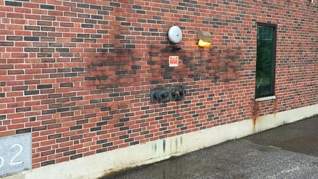 Vandal spray paints 'I'm Drunk' on side of police station