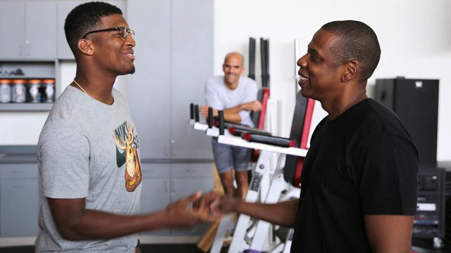 Rapper Jay Z tours One Buc Place