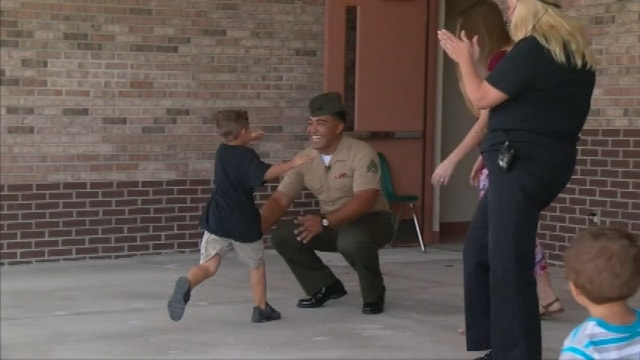 Marine dad surprises son at school assembly