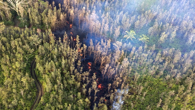Volcanic 'curtain of fire' sends people fleeing Hawaii homes