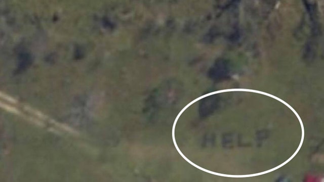 Florida family spells out 'HELP' with logs after Hurricane Michael devastates area