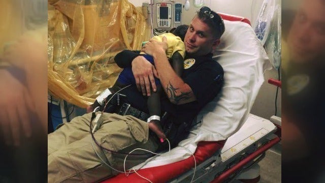 PHOTO: Savannah officer comforts young child in hospital